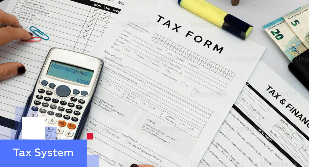 Top-down desk view with a tax form, calculator, banknotes and a planning checklist — illustrating a complete overview of the tax system in China