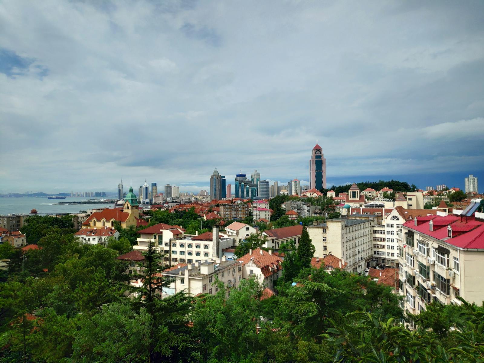 Qingdao skyline with historical buildings and modern skyscrapers — Qingdao company registration: setting up a WFOE in Qingdao Pilot FTZ and Shandong RCEP demonstration zone